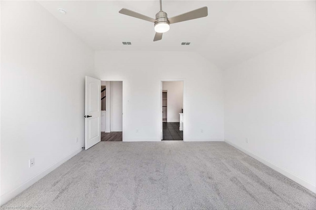 unfurnished bedroom featuring carpet flooring, ceiling fan, and lofted ceiling