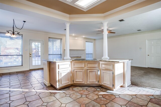 kitchen featuring dishwasher, sink, a chandelier, pendant lighting, and decorative backsplash