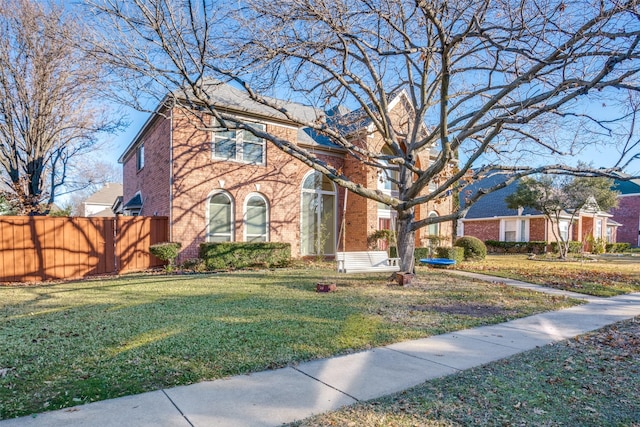 view of front of property with a front lawn