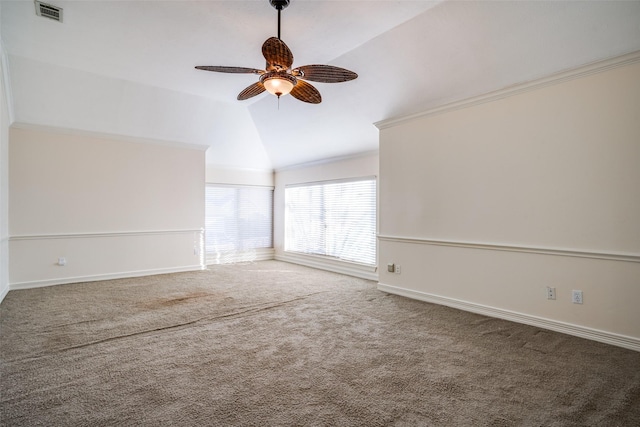 unfurnished room featuring carpet flooring, vaulted ceiling, ceiling fan, and ornamental molding