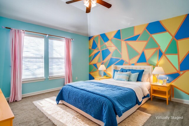 spare room featuring ceiling fan and carpet floors