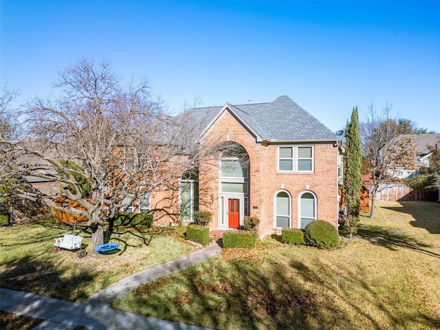 view of front of home with a front yard