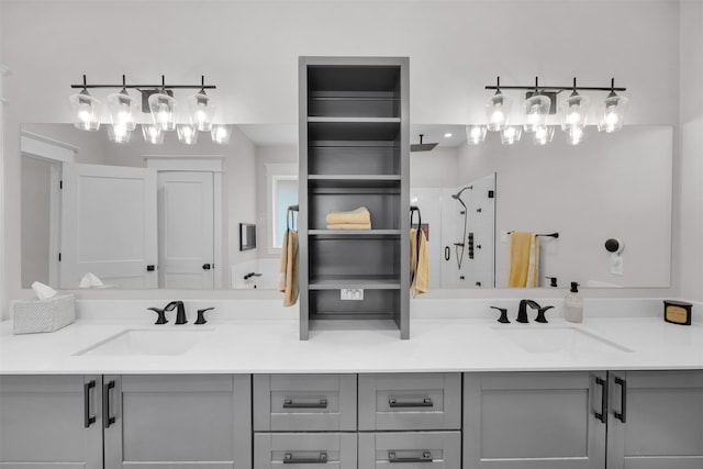 bathroom with vanity and a shower with shower door