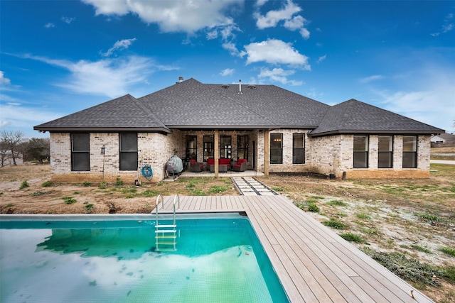 view of swimming pool featuring an outdoor hangout area and a patio