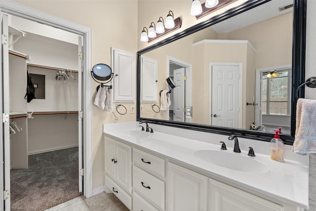 bathroom featuring tile patterned floors, vanity, and separate shower and tub