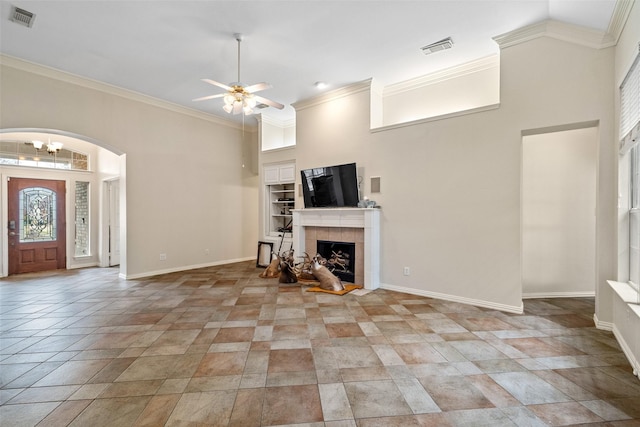 unfurnished living room featuring a fireplace, ceiling fan, and lofted ceiling