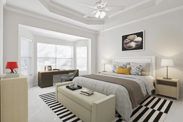 carpeted bedroom with a raised ceiling, ceiling fan, and ornamental molding