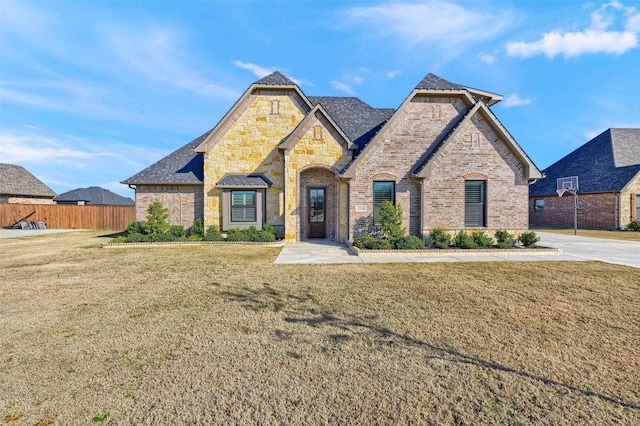 view of front of home with a front lawn