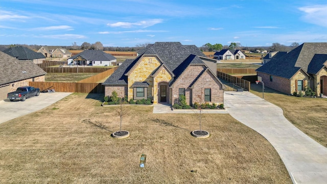 view of front facade with a front lawn