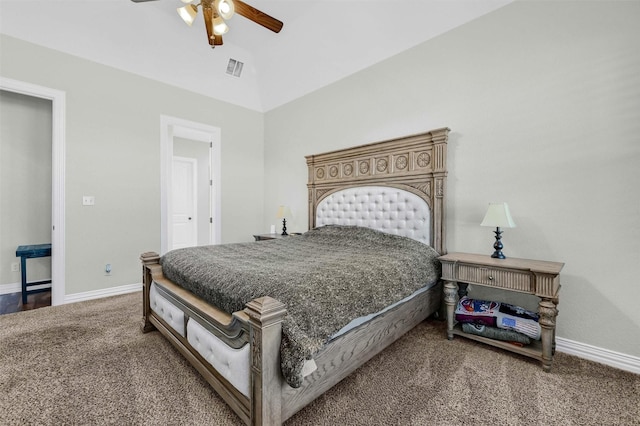 carpeted bedroom featuring ceiling fan and vaulted ceiling