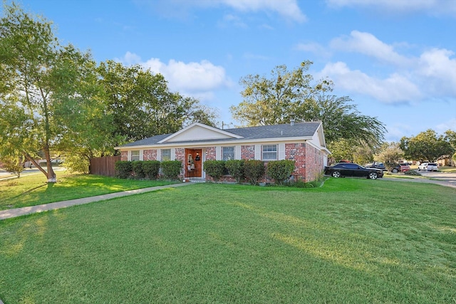 single story home featuring a front yard