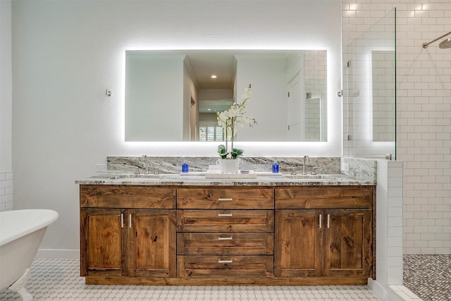 bathroom with tile patterned floors, separate shower and tub, and vanity