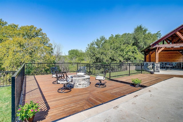 deck featuring a fire pit