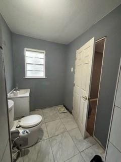 bathroom featuring toilet