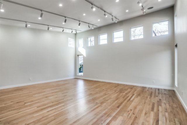 unfurnished room featuring light wood-type flooring