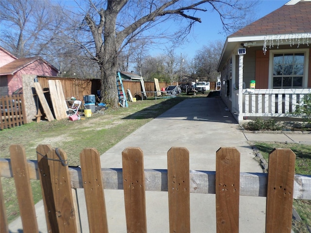 view of yard with covered porch