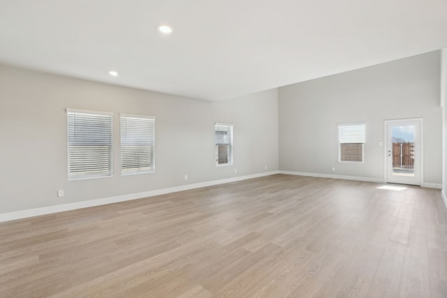 unfurnished living room featuring light hardwood / wood-style floors