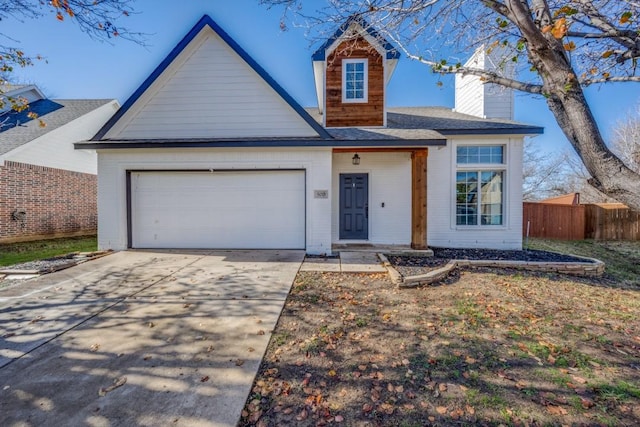 view of front of property with a garage