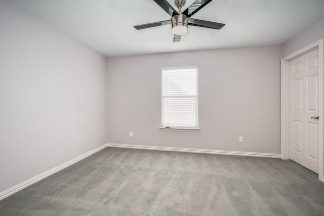 unfurnished bedroom featuring ceiling fan and light carpet