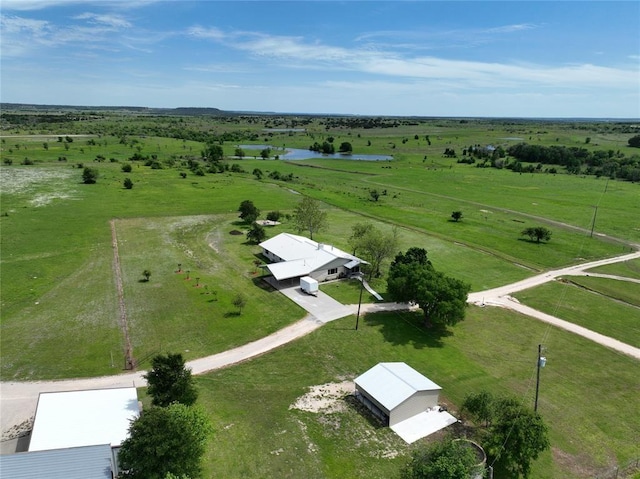 birds eye view of property featuring a rural view