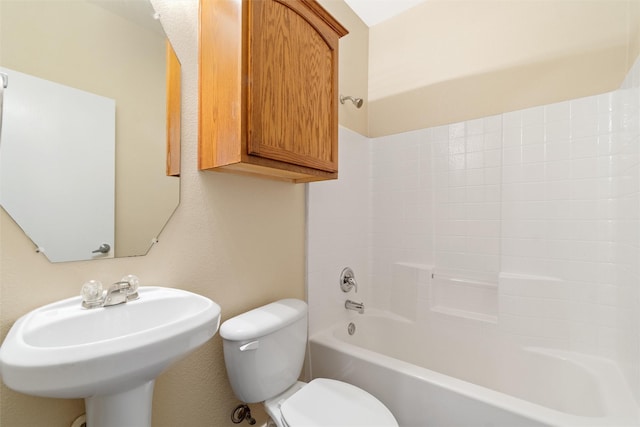 full bathroom featuring shower / tub combination, toilet, and sink