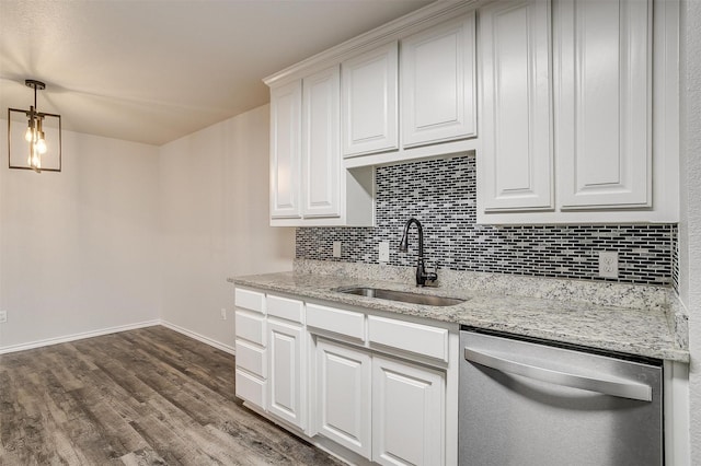 kitchen with dishwasher, sink, light stone counters, dark hardwood / wood-style floors, and white cabinets