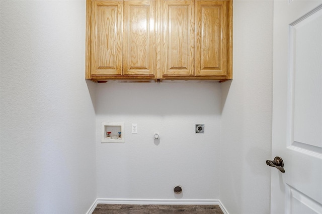 laundry room with gas dryer hookup, hookup for a washing machine, cabinets, and hookup for an electric dryer