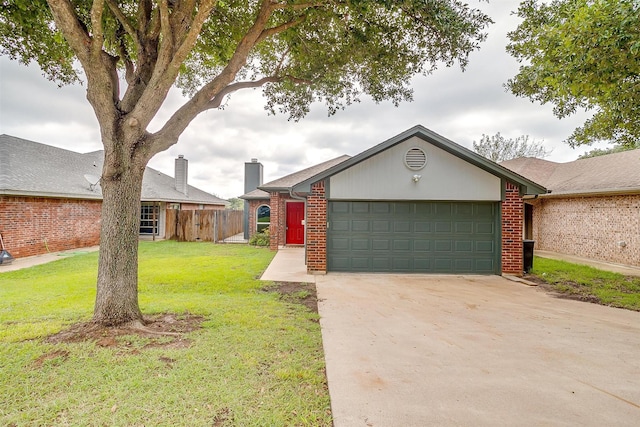 ranch-style house with a front yard and a garage