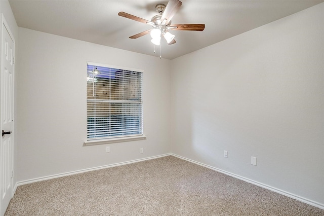 unfurnished room with carpet flooring and ceiling fan