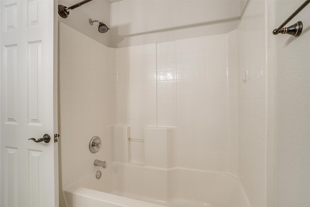 bathroom with shower / bath combination