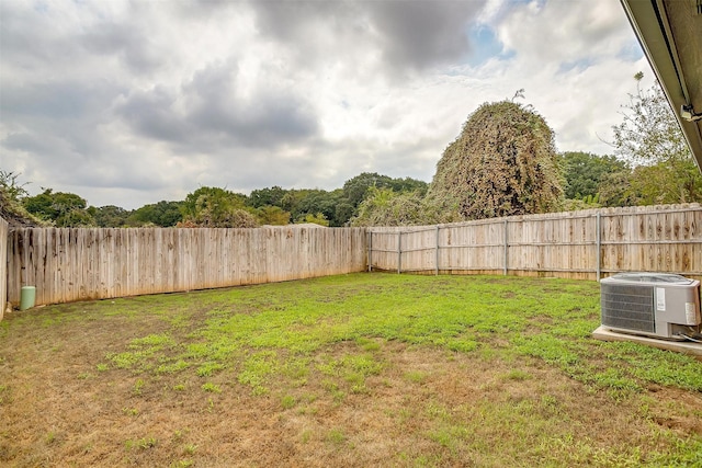 view of yard featuring central AC