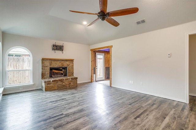 unfurnished living room with a fireplace, hardwood / wood-style floors, and ceiling fan