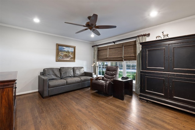 living room featuring dark hardwood / wood-style floors, ceiling fan, and ornamental molding