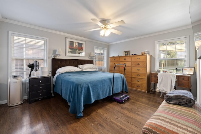 bedroom featuring ceiling fan, dark hardwood / wood-style floors, and crown molding