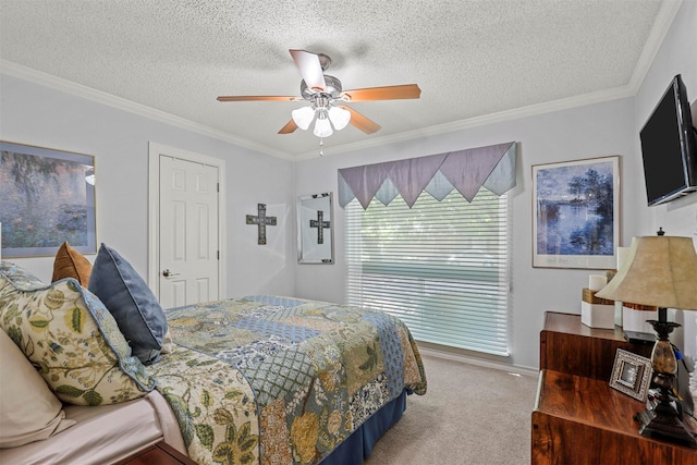 carpeted bedroom with ceiling fan, crown molding, and a textured ceiling