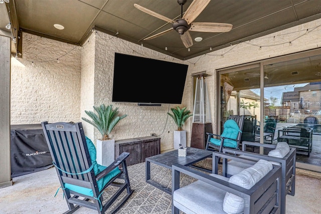 view of patio featuring outdoor lounge area and ceiling fan