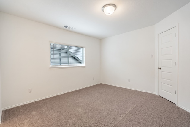 empty room featuring carpet