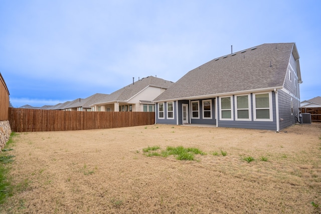 back of property with central AC unit