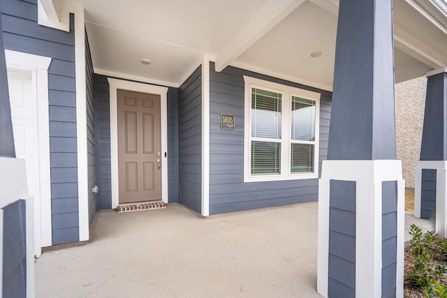 entrance to property with a porch