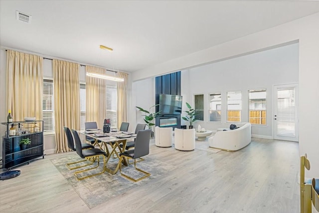 dining room featuring light hardwood / wood-style floors