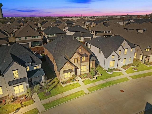 view of aerial view at dusk