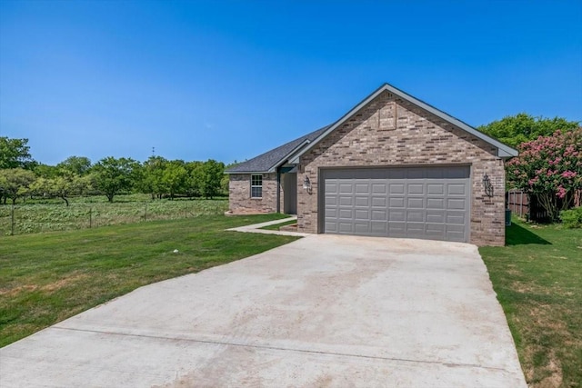 view of front facade with a front lawn and a garage