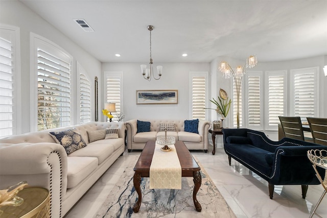 living room with a chandelier