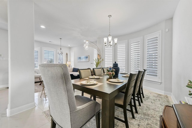 dining room featuring an inviting chandelier