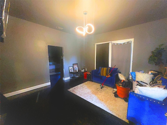 living room with an inviting chandelier