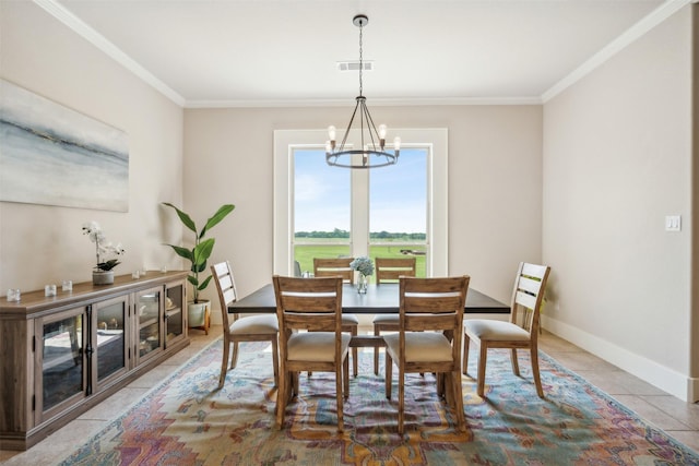 dining space featuring tile patterned flooring, an inviting chandelier, and ornamental molding