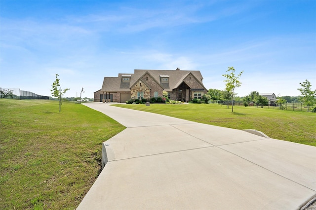 view of front facade with a front lawn