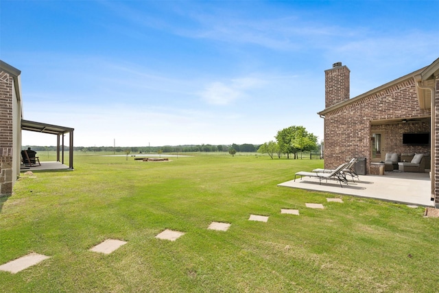 view of yard with a patio area