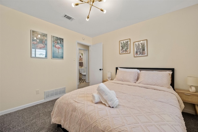 bedroom with carpet flooring and a notable chandelier