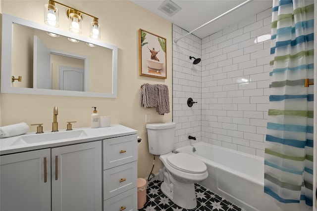 full bathroom with tile patterned floors, vanity, toilet, and shower / tub combo with curtain